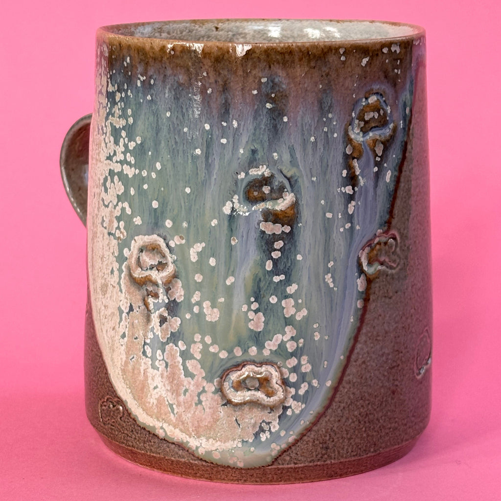 Salt fired mug with galactic glaze