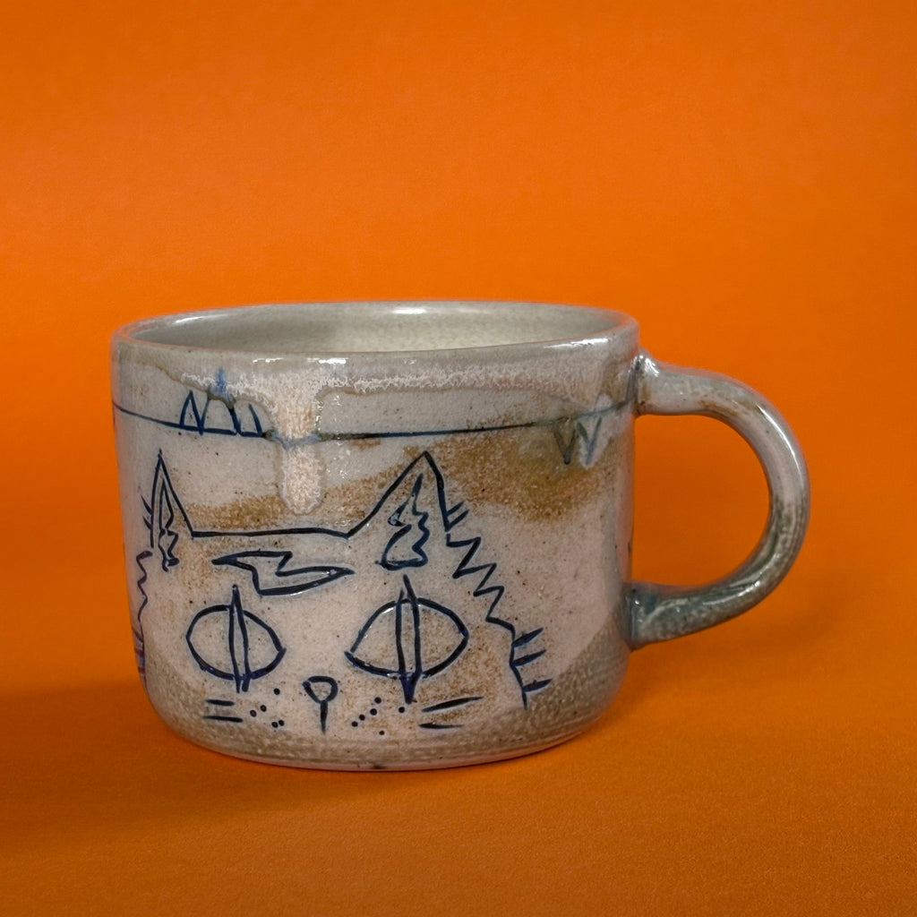 Spooked cat mug