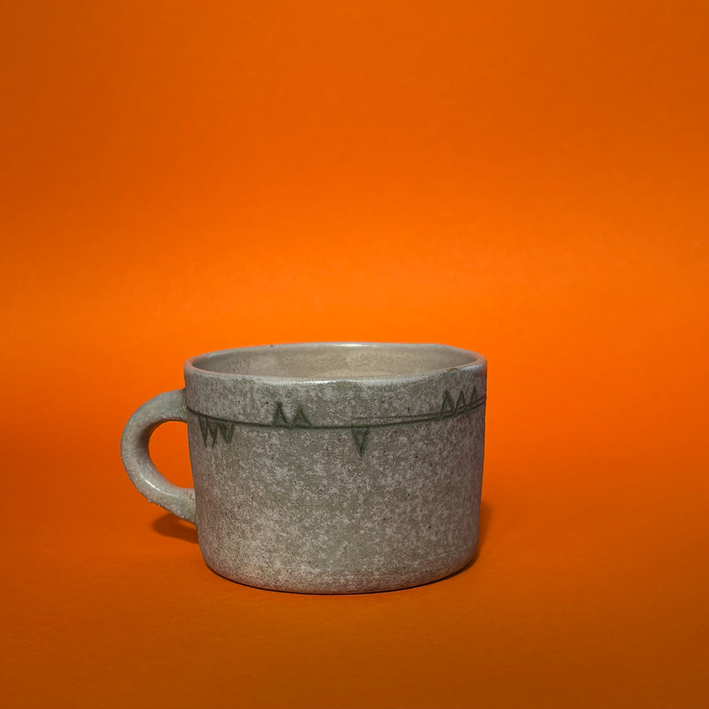 Pensive cat mug