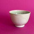 Salt fired cup with slip decoration