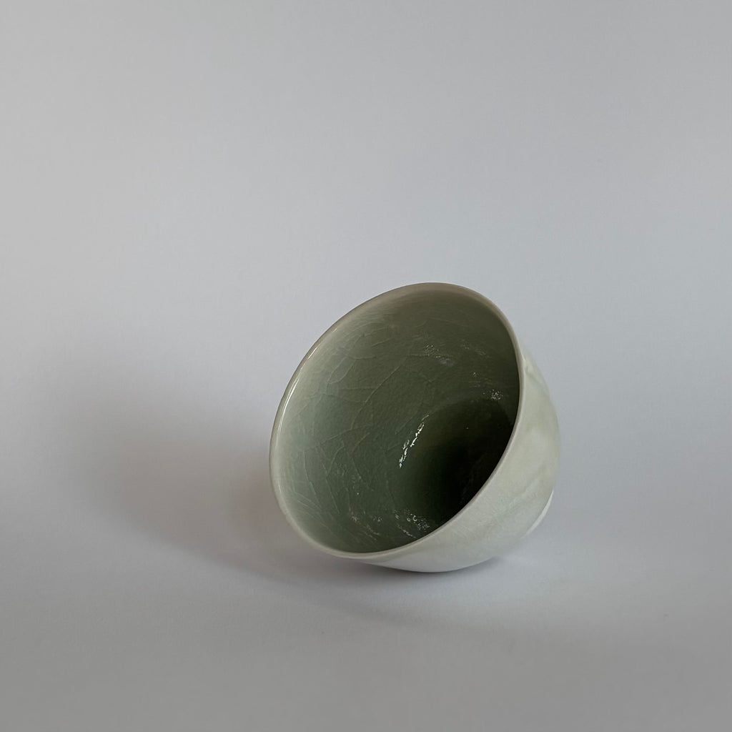 Salt fired cup with slip decoration