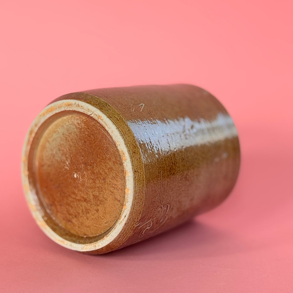 Salt fired mug with sprayed titanium glaze