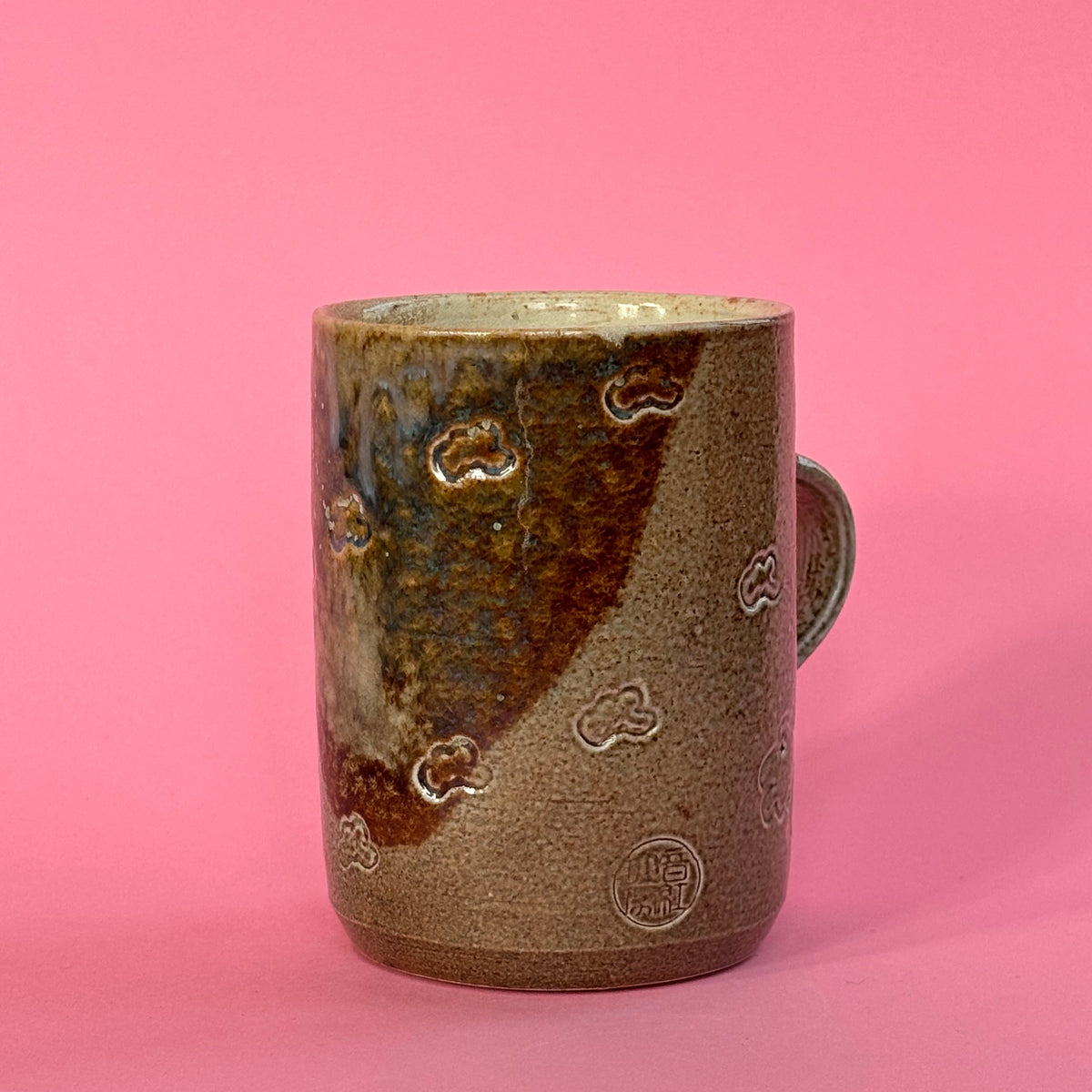 Salt fired mug with galactic glaze