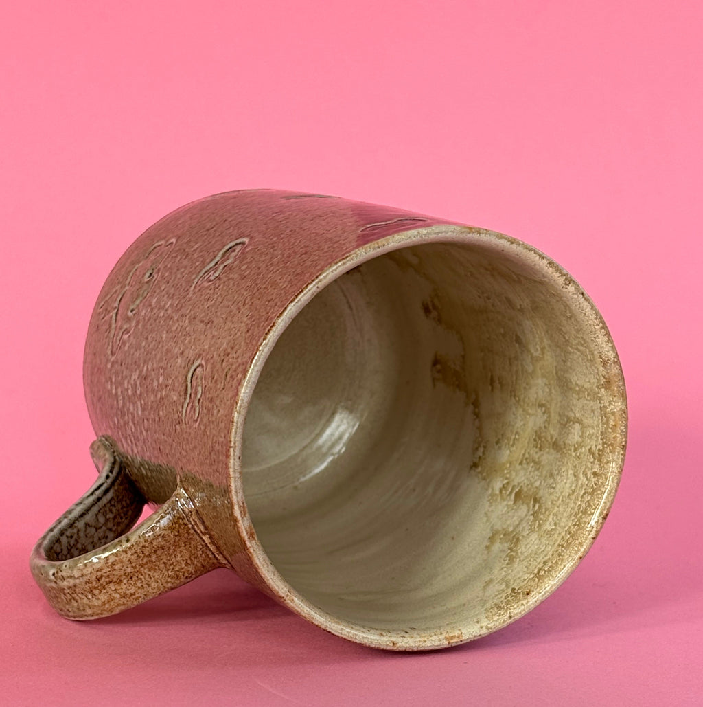 Salt fired mug with galactic glaze