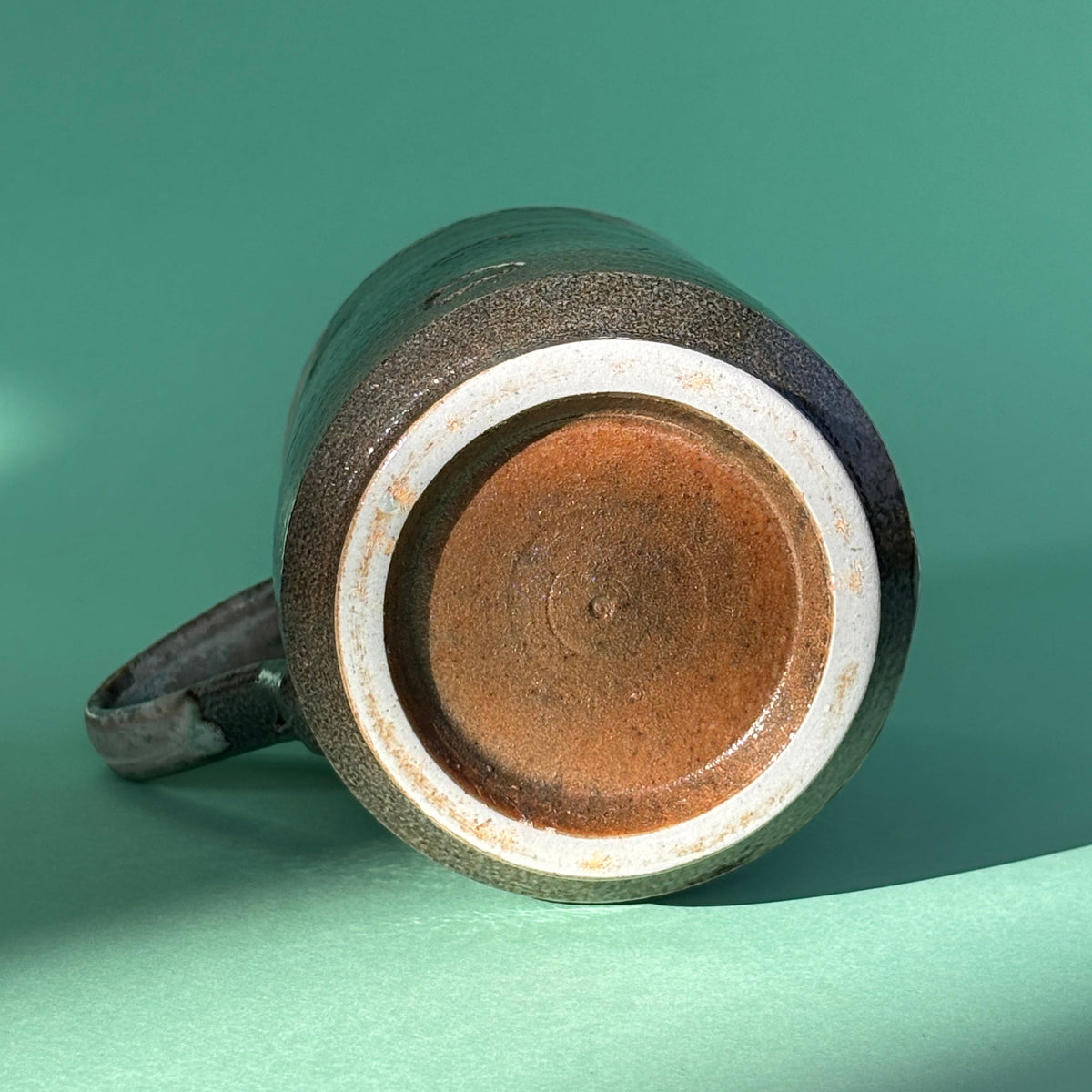 Salt fired mug with galactic glaze