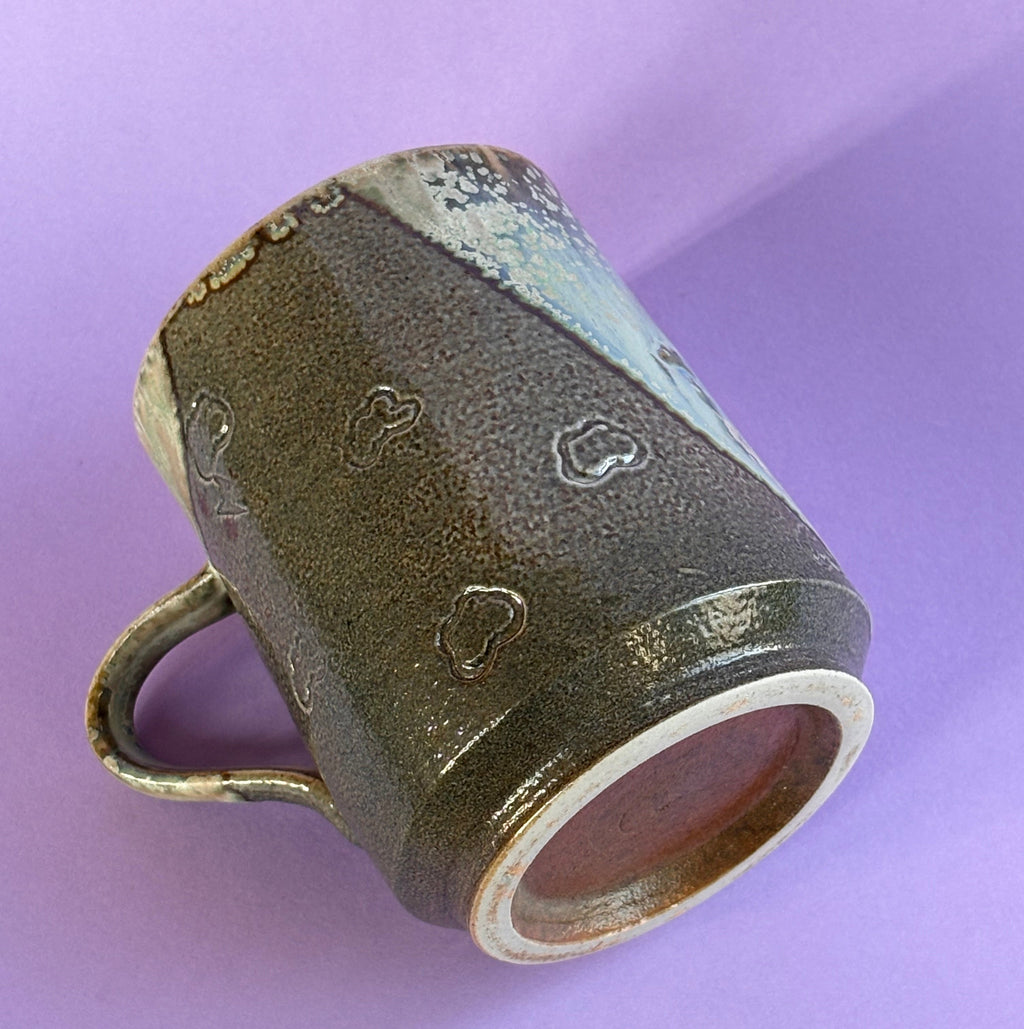 Salt fired mug with galactic glaze