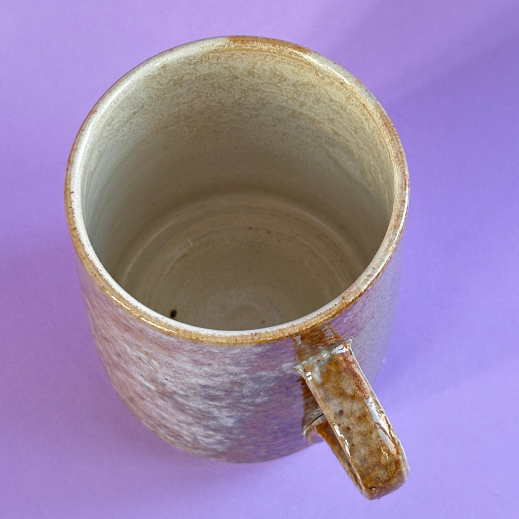 Salt fired mug with sprayed titanium glaze