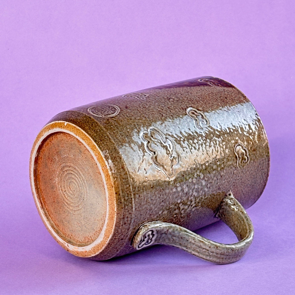 Salt fired mug with galactic glaze